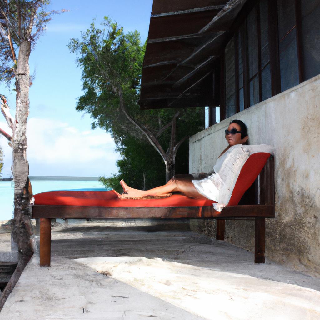 Woman lounging by beachfront villa