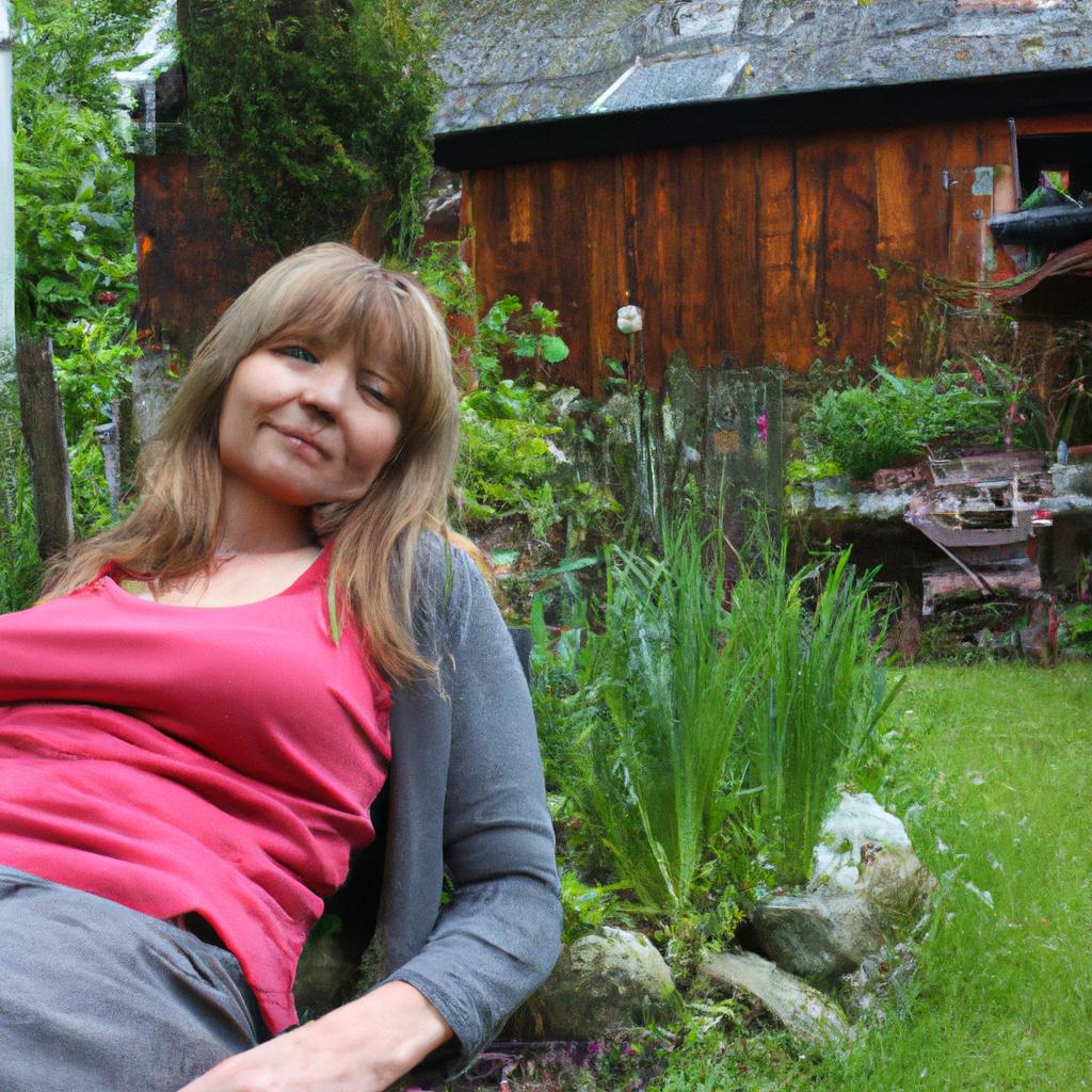 Woman relaxing in cottage garden